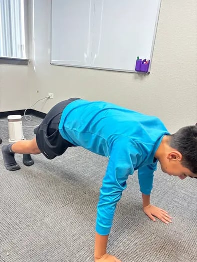 Youth Pitcher Rehabs Little League Shoulder with exercise at PRO Athlete Physical Therapy